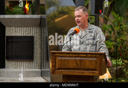 U.S. Air Force Lt. Col. David Dersch, Pacific Air Forces staff chaplain, gives opening comments during a remembrance ceremony for U.S. Army Air Corps Pfc. Joseph Nelles at the Courtyard of Heroes in the Pacific Air Forces headquarters building, Joint Base Pearl Harbor-Hickam, Hawaii, Dec. 10, 2017.  Nelles, a chaplain’s assistant, was killed during the 1941 attack on Hickam Field.  (U.S. Air Force photo by Tech. Sgt. Heather Redman) Stock Photo