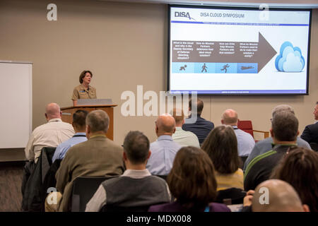 Defense Information Systems Agency is a United States Department of Defense combat support agency responsible for providing information technology and communications support to national leaders, the military services, and combatant commands. On December 12, 2017, nearly 1,000 information technology experts met at Fort George G. Meade, Maryland, for the agency’s first Cloud Symposium focused on enterprise cloud adoption. The archival image documents the educational conference setting. Stock Photo