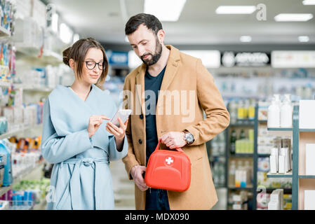 Couple in the pharmacy store Stock Photo