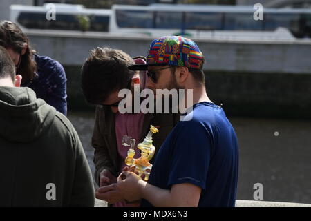 Dublin, Ireland. 20th April 2018. Ireland: People gather outside goverment buildings in Dublin to smoke cannabis on Iternational Marijuana Day Credit: john Rooney/Alamy Live News Stock Photo