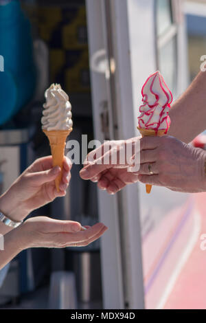 Stratford upon Avon Warwickshire England UK people buying ice cream during the mini heatwave over Shakespeares birthday weekend Stock Photo