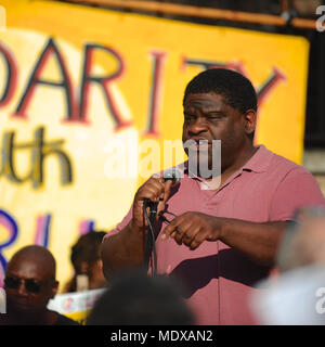 London, UK. 20th April, 2018. Gary Younge (British journalist, author and broadcaster) speaking at a Windrush Generation Solidarity demonstration, London, United Kingdom.  The demonstration was called in response to the Home Office's incompetence and  bureaucratic brutality towards the Windrush generation.  The Windrush generation refers to the workers from Jamaica, Trinidad and Tobago and other islands who arrived in London between 1948 and 1971 as a response to post-war labour shortages in the UK. Credit: Michael Preston/Alamy Live News