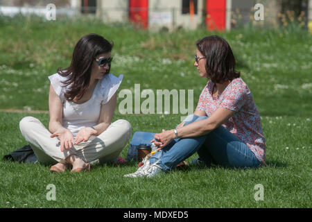 London, UK. 21st April, 2018. Members of the public relax in the spring sunshine in Saint James's Park Credit: amer ghazzal/Alamy Live News Stock Photo