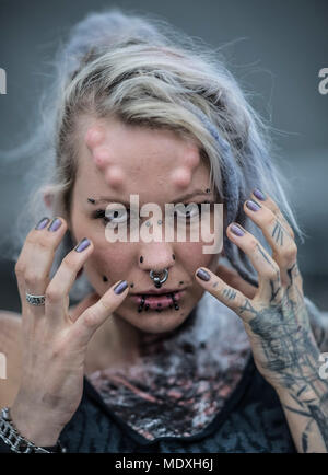 Frankfurt, Germany. 21st April, 2018.  Suma presents her tattoos at a tattoo convention where tattoo artists and enthusiasts travel from far and wide to exchange ideas, techniques and knowledge. Photo: Boris Roessler/dpa Credit: dpa picture alliance/Alamy Live News Stock Photo