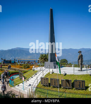 Darjeeling Toy Train and war memorial, The Darjeeling Himalayan Railway; Darjeeling, West Bengal, India Stock Photo