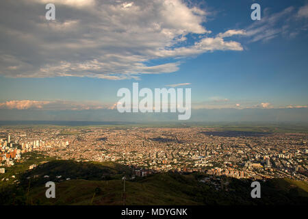 A sunset view of the city of Santiago de Cali from a mountain. Stock Photo