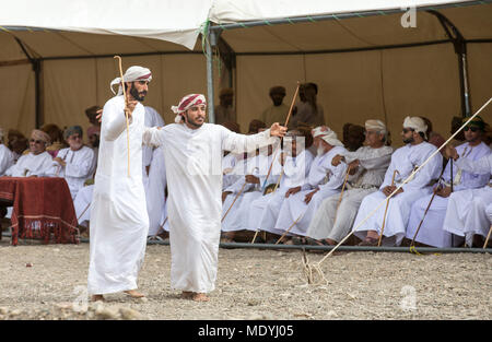 khadal, Oman,7th April 2018: omani men in traditional clothing, with their  camels, gathering to celebrate Eid Stock Photo - Alamy