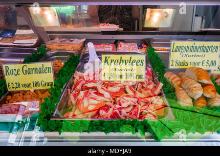 Counter with fresh seafood and surimi on display at fish stall along the Visserskaai in the city Ostend / Oostende, Belgium Stock Photo