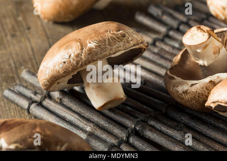 Raw Organic Portobello Mushrooms Ready to Cook Stock Photo