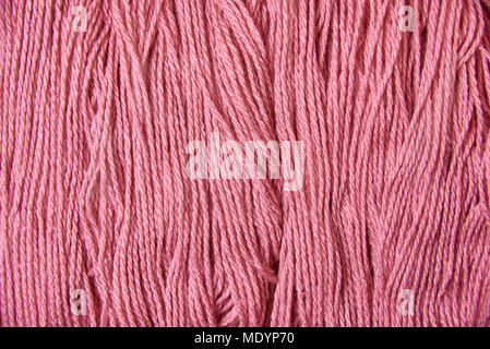 Background texture of pink thread for yarn. Stock Photo
