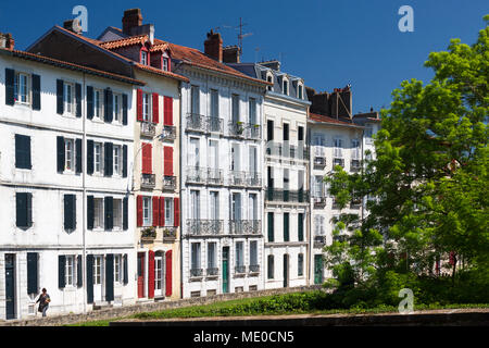 Typical storeyed terraced houses of the Big Bayonne district street (Bayonne Atlantic Pyrenees Aquitaine France). Typical storied town houses. Stock Photo