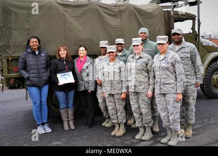 The North Whales Borough Parks and Recreation Military Living History Association, based in Hatboro, Pa., dropped off items donated during the collection campaign held at their historical tour event, A Soldier’s Christmas, to help the families of deployed service members Dec. 12, 2017, at Horsham Air Guard Station, Pa. The donation exhibits the continued support of State military members by local civilian organizations here despite the operational closure of Naval Air Station Joint Reserve Base Willow Grove Sept. 15, 2011. (U.S. Air National Guard photo by Tech. Sgt. Andria Allmond) Stock Photo