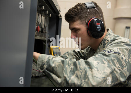 361st Training Squadron is a unit within the 82nd Training Wing at Sheppard Air Force Base that instructs aerospace ground equipment apprentices. The archival image documents a student using a multimeter to check voltage on an air conditioning unit during block 11 maintenance training at Sheppard Air Force Base, Texas, on December 15, 2017. Stock Photo