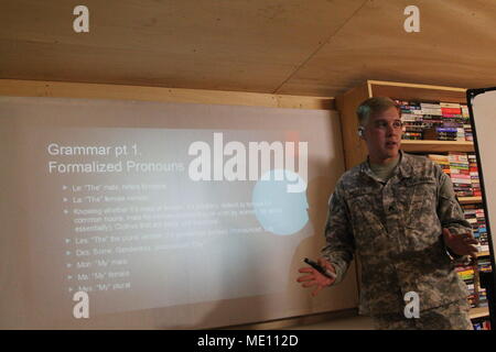 Sgt. Nathan Pelletti, of the 40th Expeditionary Signal Battalion, 11th Theater Tactical Signal Brigade, teaches a French class at Contingency Location Garoua, Cameroon, as part of Task Force Darby, Dec. 18. TF Darby soldiers are serving in a support role for the Cameroon military’s fight against the violent extremist organization Boko Haram. (Photo by Staff Sgt. Christina J. Turnipseed, Contingency Location Garoua Public Affairs) Stock Photo