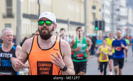 Brighton, Sussex, UK; 15th April 2018; Man Wearing Green Sunglasses Runs in Brighton Marathon Stock Photo