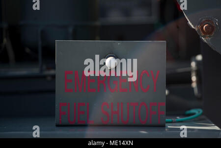 An emergency shutoff sign is bolted down on an R-12 truck, Dec. 21, 2017, at Kadena Air Base, Japan. The refueling maintenance shop is an outlying vehicle maintenance shop of the 18th Wing Logistics Readiness Squadron at Kadena AB that specializes in maintaining and repairing refuel vehicles. (U.S. Air Force photo by Senior Airman Jessica H. Smith) Stock Photo