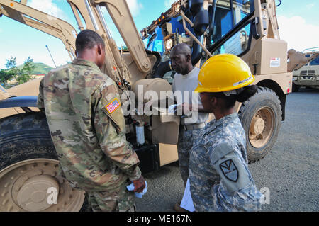 Virgin Islands National Guard personnel from two engineer units train on six newly received High Mobility Engineer Excavators Type 1 on St. Croix at the Estate Bethlehem Military Compound, Dec. 13. 19 personnel from the 662nd Engineer Support Company and the 631st Engineer Detachment participated in New Equipment Training for six HMEE Type 1 that were assigned to the 662 Eng. Co. Instructors from the United States Army Tank-automotive and Armaments Command, out of Warren, Michigan, were on hand to support the training. Stock Photo