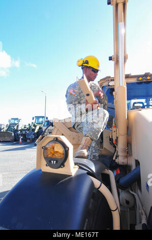 Virgin Islands National Guard personnel from two engineer units train on six newly received High Mobility Engineer Excavators Type 1 on St. Croix at the Estate Bethlehem Military Compound, Dec. 13. 19 personnel from the 662nd Engineer Support Company and the 631st Engineer Detachment participated in New Equipment Training for six HMEE Type 1 that were assigned to the 662 Eng. Co. Instructors from the United States Army Tank-automotive and Armaments Command, out of Warren, Michigan, were on hand to support the training. Stock Photo