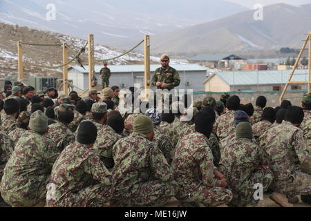 An Afghan Commando instructor conducts a brief of the rope obstacle as ...