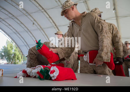 Special Purpose Marine Air-Ground Task Force – Crisis Response – Central Command 17.2 was deployed under U.S. Central Command in 2017. On Dec. 8, 2017, Marines assigned to the task force received Christmas stockings sent by a non-profit organization while serving in the Middle East. The archival image documents seasonal morale support for deployed personnel. Stock Photo