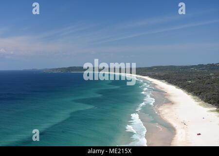 Tallow Beach viewed from Cape Byron Lighthouse in Byron Bay NSW. Australia's most easterly point and very popular tourist destination. Stock Photo