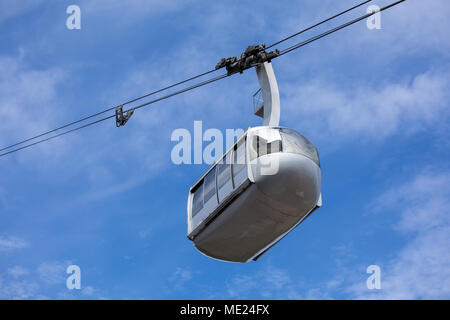 Portland aerial tram for public transportation to Oregon Health and Science University on a cloudy sky Stock Photo