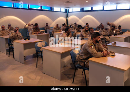 Twenty-seven Kuwaiti Marines gathered in a classroom at the Kuwait Naval Institute to attend the Tactical Resupply Subject Matter Expert Exchange with U.S. Marines from the Command Element and Logistics Combat Element, Special Purpose Marine Air-Ground Task Force – Crisis Response – Central Command. Exchanging logistic concepts and best practices allowed participants to learn from each other and strengthened relationships. Stock Photo
