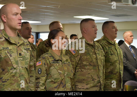 Army Maj. Terri Rae Lopez-Homestead stands among the nine 100th Missile Defense Brigade (GMD) Soldiers who were honored during a Dec. 5, 2017, graduation ceremony at 100th MDB Headquarters in Colorado Springs, Colo., to recognize their successful completion of the Ground-based Midcourse Defense Fire Control Operator Qualification Course (GQC). Homestead is now serving as the first female tactical crew director of a missile defense crew at Fort Greely, Alaska. (U.S. Army National Guard photo by Capt. Jennifer Beyrle/Released) Stock Photo