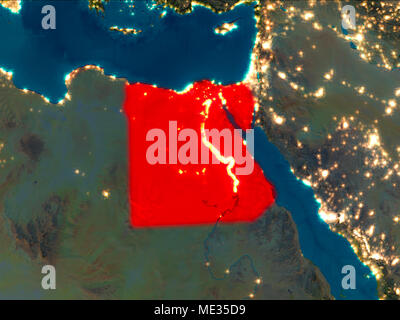 Satellite night view of Egypt highlighted in red on planet Earth. 3D illustration. Elements of this image furnished by NASA. Stock Photo