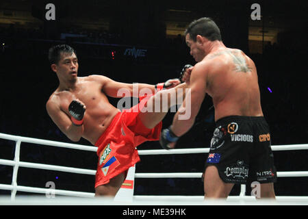 Pasay City, Philippines. 20th Apr, 2018. Honorio Banario lands a clean kick to the chest of Adrian Pang. Credit: Dennis Jerome Acosta/ Pacific Press/Alamy Live News Stock Photo