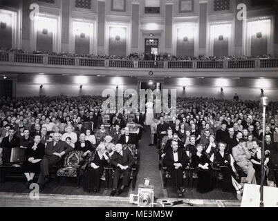 Audience at the Royal Geographical Society lecture at City Hall,. Stock Photo