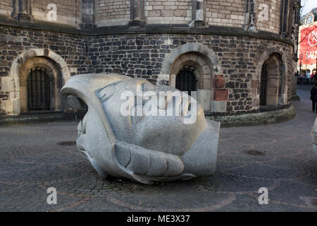 Face sculpture below Münsterplatz or Bonn Cathedral, Bonn, North Rhineland Westphalia, Germany Stock Photo