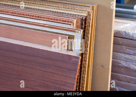 MDF, PARTICLE BOARD. Wood panels of different thicknesses and colors. Furniture fittings for furniture production on an industrial scale, and also for Stock Photo