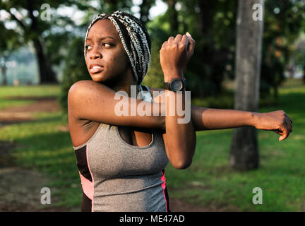People stretching in a park Stock Photo
