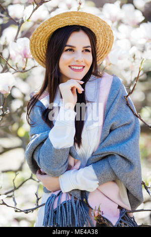 The Beautiful Girl In A Straw Hat In The Garden2 Stock Photo - Alamy