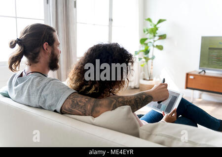 Couple relaxing at home Stock Photo