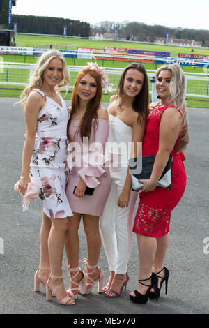 Racegoers arrive for the Coral Scottish Grand National 2018 meeting at Ayr Racecourse. Stock Photo
