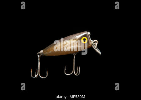 A vintage fishing lure also known as a plug from a fishing tackle  collection Dorset England UK GB Stock Photo - Alamy