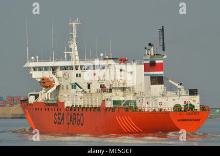 Cargo Ship heading down the River Thames in London Stock Photo