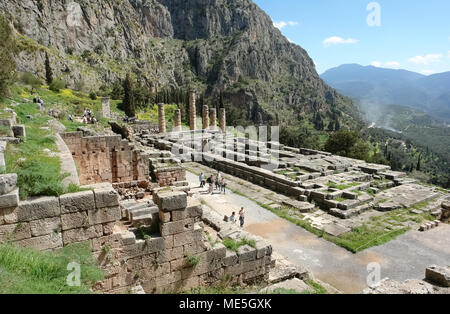 Delphi, Greece - March 30, 2015: View of ruins of the temple of Apollo at Delphi, Greece. Stock Photo