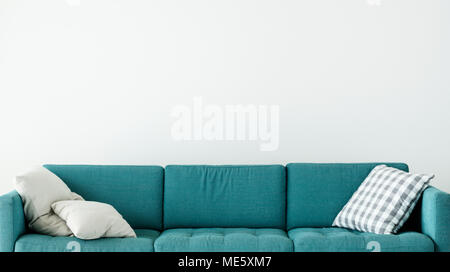 Comfortable couch with cushion isolated no people Stock Photo