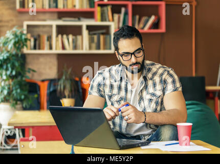Bearded Man Working Stock Photo