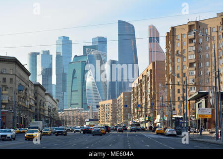 Moscow, Russia - March 17, 2018. Street view on Bolshaya Dorogomilovskaya street in Moscow, with skyscrapers of Moscow City, residential buildings, co Stock Photo