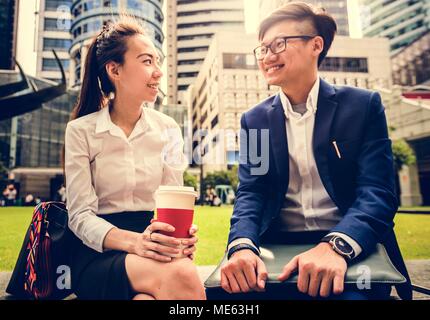 Asian business people having a break time Stock Photo