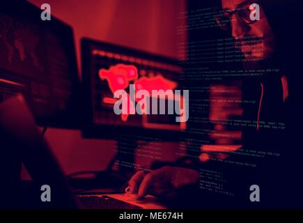 Diverse computer hacking shoot Stock Photo - Alamy