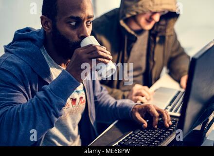 African descent man working with computer laptop Stock Photo