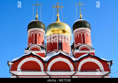 Domes and cross of the Cathedral of Znamensky Monastery in Moscow, Russia Stock Photo