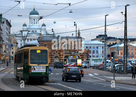 General view of the Helsinki city with the tram, market, and the Senaatintori Lutheran Cathedral from the Eteläranta street. Stock Photo