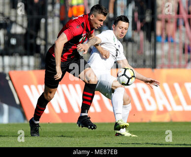 BUDAPEST, HUNGARY - JUNE 27: (l-r) Tokmac Chol Nguen of Ferencvarosi TC  fights for the ball with Dániel Farkas of Mezokovesd Zsory FC during the  Hungarian OTP Bank Liga match between Ferencvarosi TC and Mezokovesd Zsory  FC at Groupama