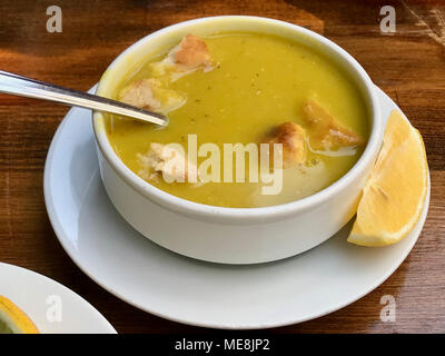 Turkish Lentil Soup with Lemon and Pita Pide Bread / Mercimek Corbasi / Corba. Traditional Food. Stock Photo